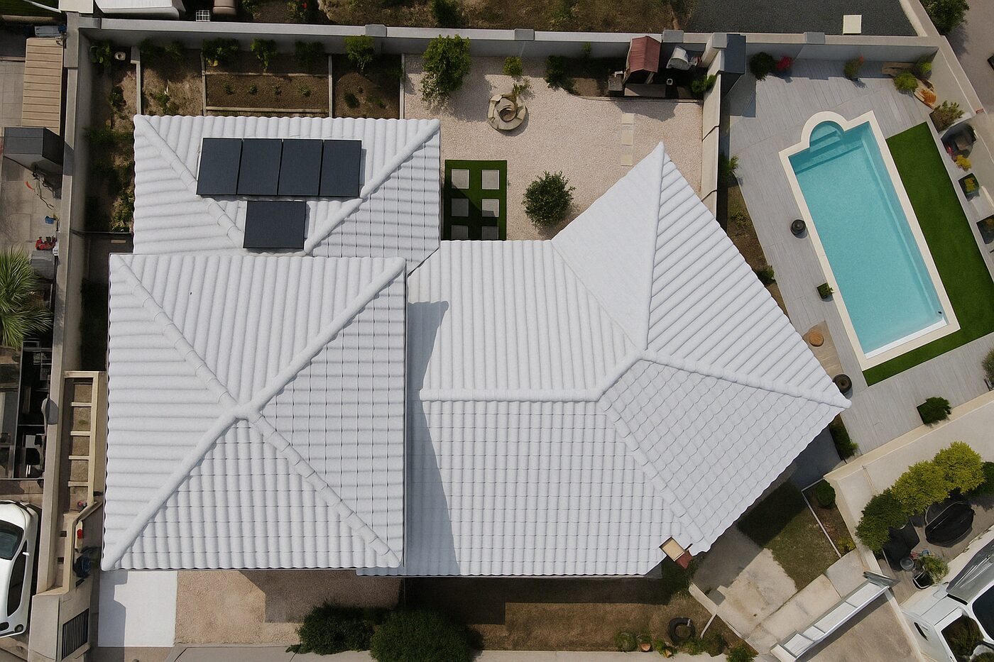 Toiture traitée en cool roof blanc réfléchissant par WB Toit Concept — Perpignan (66), chantier 10